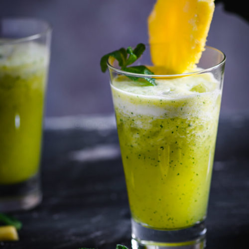 1 pineapple , peeled and chopped 1/2 cup mint leaves 10-12 ice cubes Few mint sprigs Method: Place pineapple, mint and ice in a blender. Blend until smooth. Pour into glasses. Pineapple mint frappe Pineapple mint frappe Top with mint sprigs. Pineapple mint frappe Pineapple mint frappe Serve chilled.