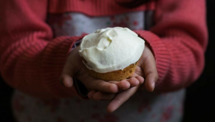 Gluten free carrot cake muffins with cream cheese frosting